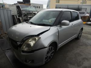 2010 Suzuki Swift RS415 image 1